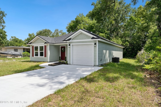 127 Azalea Cir, Palatka, FL 32177 - ranch-style home with a garage, driveway, a front yard, and central AC unit