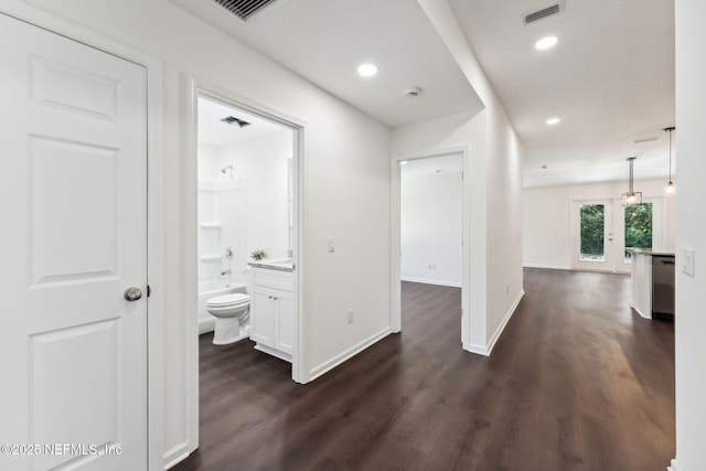 127 Azalea Cir, Palatka, FL 32177 - hallway with dark wood-style flooring, baseboards, and recessed lighting
