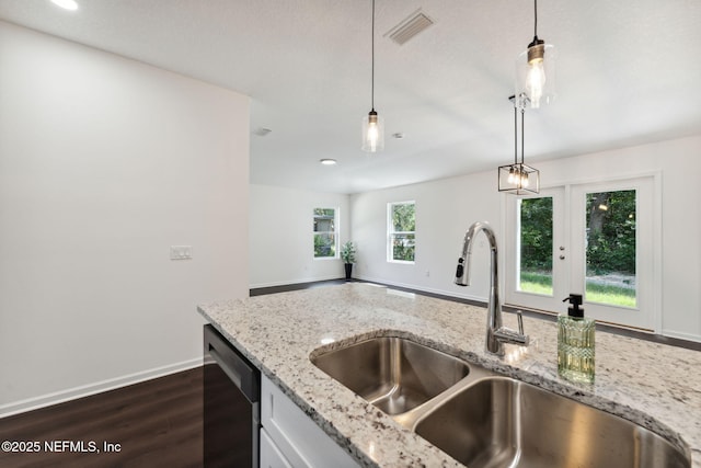 127 Azalea Cir, Palatka, FL 32177 - kitchen with a sink, dishwasher, baseboards, dark wood finished floors, and pendant lighting