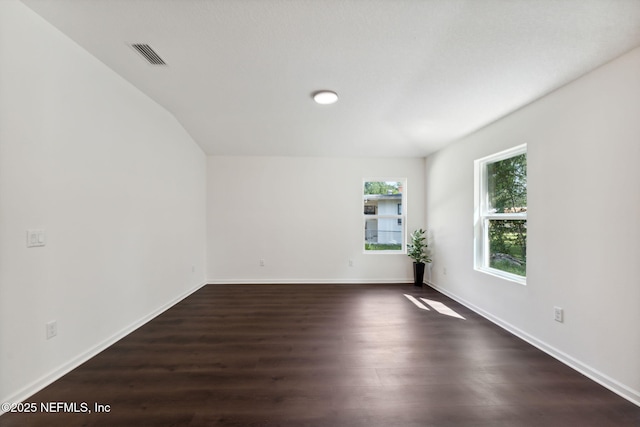 127 Azalea Cir, Palatka, FL 32177 - empty room featuring dark wood-style floors and baseboards