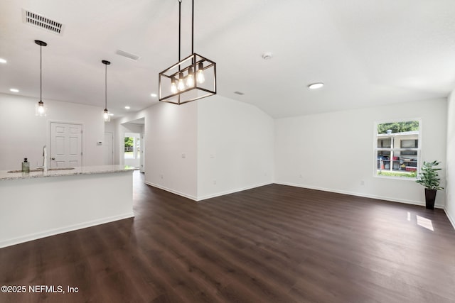 127 Azalea Cir, Palatka, FL 32177 - unfurnished living room with recessed lighting, dark wood-type flooring, plenty of natural light, a sink, and baseboards