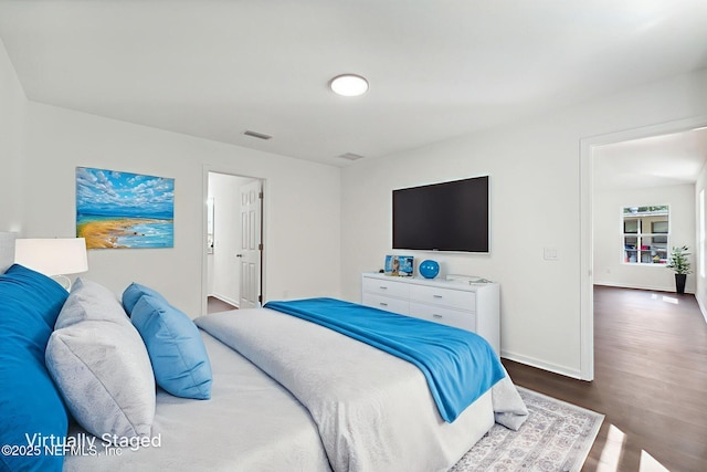 127 Azalea Cir, Palatka, FL 32177 - bedroom featuring wood finished floors and baseboards