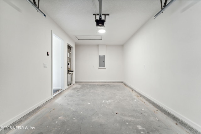 127 Azalea Cir, Palatka, FL 32177 - garage featuring electric panel, baseboards, and a garage door opener
