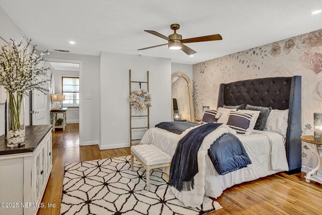 3741 Orlando Cir E, Jacksonville, FL 32207 - bedroom featuring wallpapered walls, wood finished floors, baseboards, ceiling fan, and recessed lighting