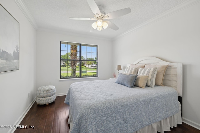 53 Waterbridge Pl, Ponte Vedra Beach, FL 32082 - bedroom featuring a textured ceiling, dark wood-style floors, ornamental molding, baseboards, and a ceiling fan