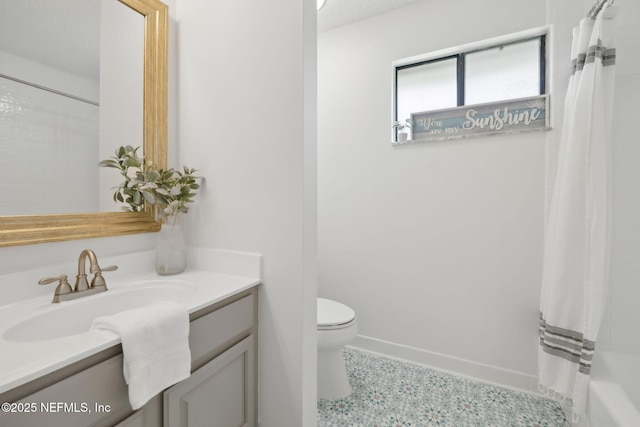 53 Waterbridge Pl, Ponte Vedra Beach, FL 32082 - full bathroom featuring vanity, toilet, shower / bathtub combination with curtain, and baseboards