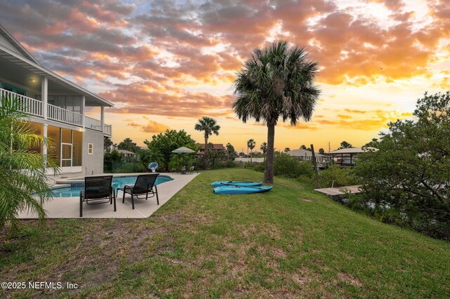 231 Barrataria Dr, Saint Augustine, FL 32080 - view of yard featuring an outdoor pool, a patio, and a balcony