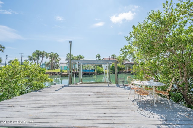 231 Barrataria Dr, Saint Augustine, FL 32080 - dock area featuring a water view and boat lift