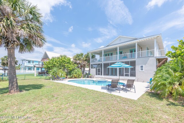 231 Barrataria Dr, Saint Augustine, FL 32080 - swimming pool with a patio area and a sunroom