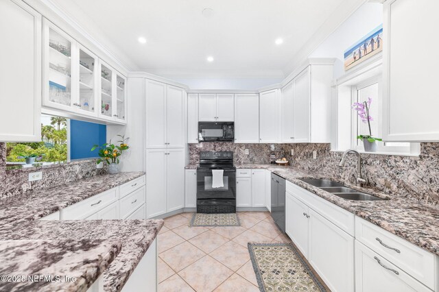 231 Barrataria Dr, Saint Augustine, FL 32080 - kitchen with black appliances, a sink, white cabinetry, ornamental molding, and recessed lighting
