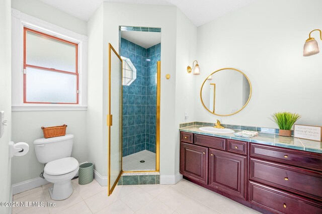 231 Barrataria Dr, Saint Augustine, FL 32080 - bathroom featuring toilet, vanity, a shower stall, and baseboards