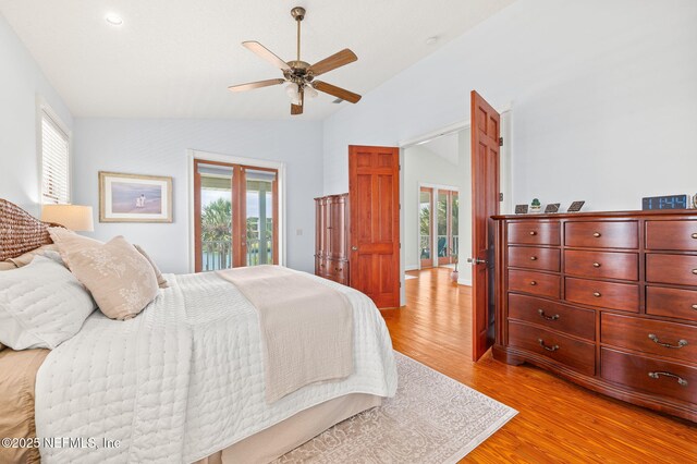 231 Barrataria Dr, Saint Augustine, FL 32080 - bedroom featuring lofted ceiling, light wood-style floors, access to outside, and a ceiling fan