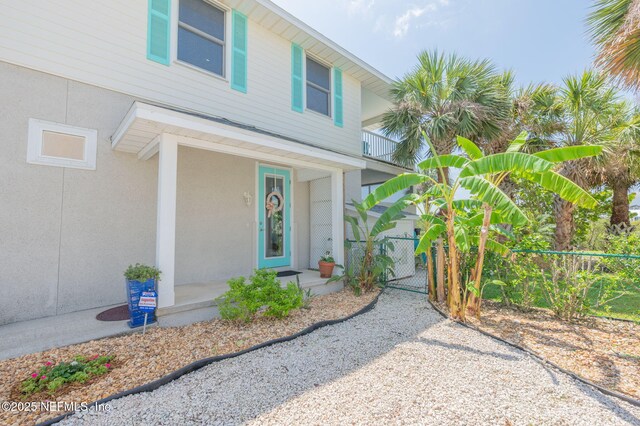 231 Barrataria Dr, Saint Augustine, FL 32080 - view of front of home featuring a gate