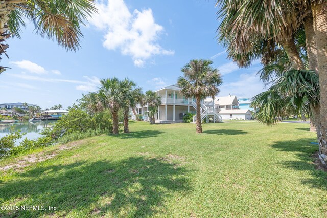 231 Barrataria Dr, Saint Augustine, FL 32080 - view of grassy yard with a water view