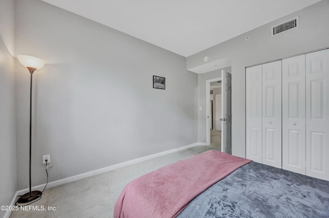 425 S Villa San Marco Dr Unit 302, Saint Augustine, FL 32086 - bedroom featuring carpet floors, baseboards, and a closet