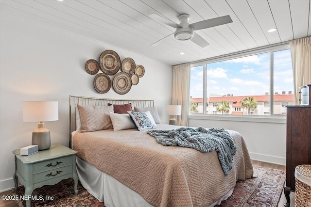 901 Ocean Blvd Unit 91, Atlantic Beach, FL 32233 - bedroom featuring wood finished floors, multiple windows, baseboards, ceiling fan, and wooden ceiling