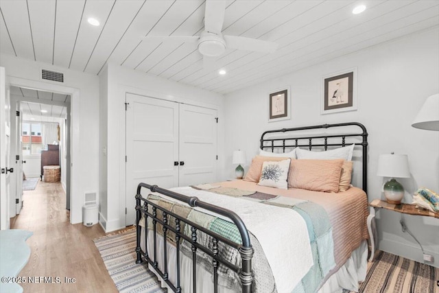 901 Ocean Blvd Unit 91, Atlantic Beach, FL 32233 - bedroom featuring a closet, recessed lighting, wood finished floors, wooden ceiling, and baseboards