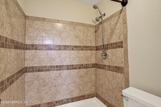2650 Cardigan Ct, Orange Park, FL 32065 - full bathroom featuring a tile shower and toilet