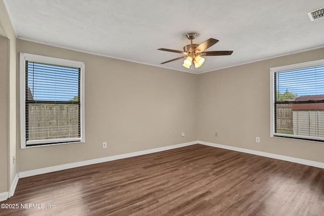 2650 Cardigan Ct, Orange Park, FL 32065 - unfurnished room with wood finished floors, ceiling fan, ornamental molding, and baseboards