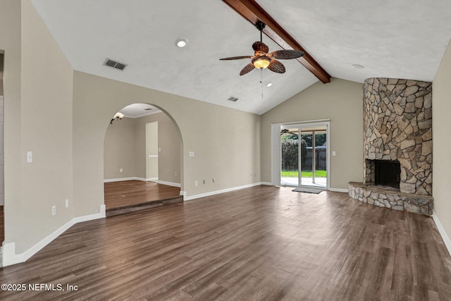 2650 Cardigan Ct, Orange Park, FL 32065 - unfurnished living room with ceiling fan, wood finished floors, a stone fireplace, and baseboards