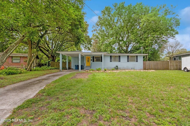 7456 Burlingame Dr S, Jacksonville, FL 32211 - view of front facade featuring driveway and an attached carport