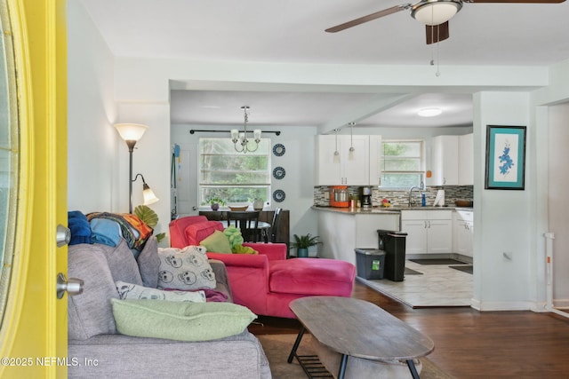 7456 Burlingame Dr S, Jacksonville, FL 32211 - living room featuring dark wood-type flooring and a ceiling fan