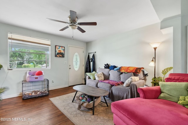 7456 Burlingame Dr S, Jacksonville, FL 32211 - living room featuring ceiling fan, wood finished floors, and baseboards