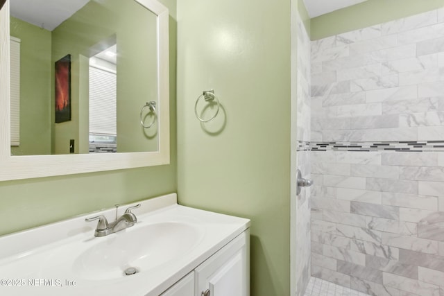 7456 Burlingame Dr S, Jacksonville, FL 32211 - bathroom featuring vanity and tiled shower