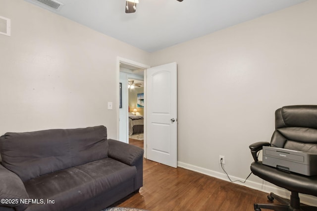 7456 Burlingame Dr S, Jacksonville, FL 32211 - office space featuring a ceiling fan, baseboards, and wood finished floors