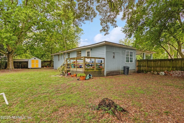 7456 Burlingame Dr S, Jacksonville, FL 32211 - rear view of house with a wooden deck