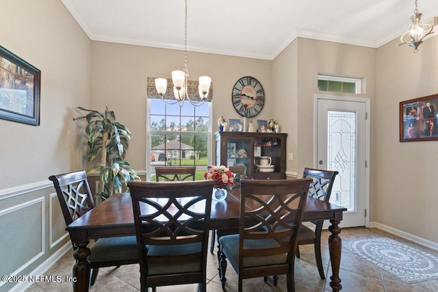 3912 Pipit Pt, Middleburg, FL 32068 - dining area featuring a chandelier and ornamental molding