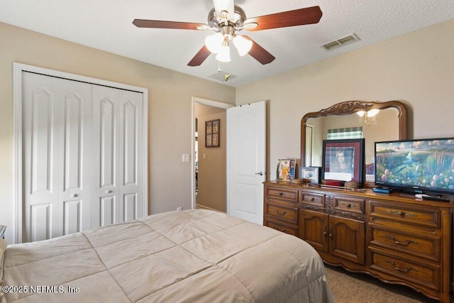 3912 Pipit Pt, Middleburg, FL 32068 - bedroom featuring a closet, carpet, and a ceiling fan