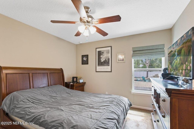 3912 Pipit Pt, Middleburg, FL 32068 - bedroom featuring light carpet, baseboards, ceiling fan, and a textured ceiling