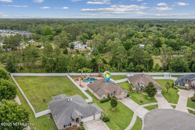 3912 Pipit Pt, Middleburg, FL 32068 - aerial perspective of suburban area with a heavily wooded area