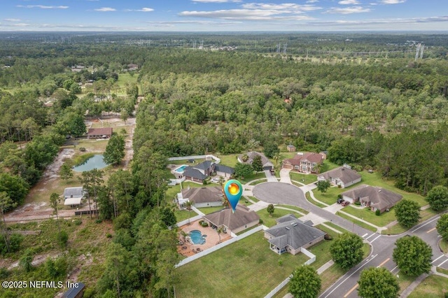 3912 Pipit Pt, Middleburg, FL 32068 - aerial view of property and surrounding area with a heavily wooded area