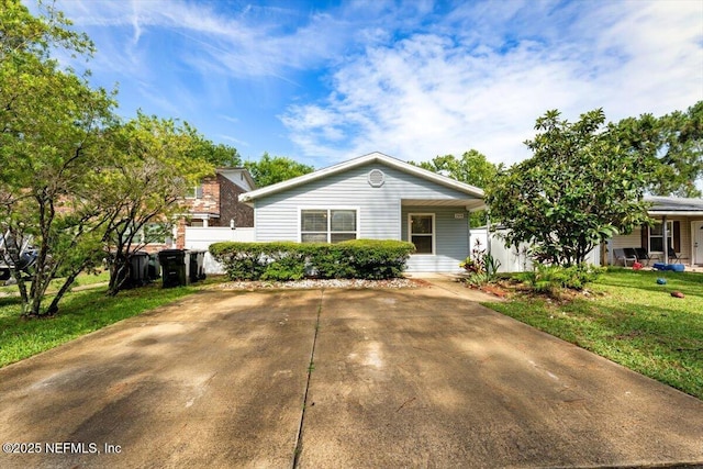 1528 Jordan St, Atlantic Beach, FL 32233 - view of front facade featuring a front lawn