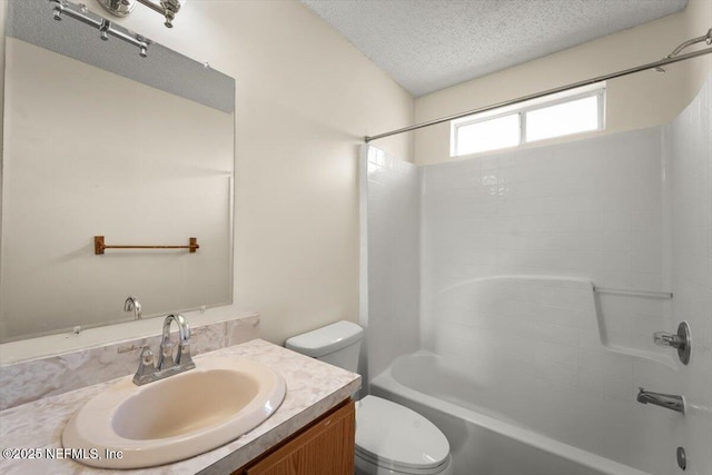 1528 Jordan St, Atlantic Beach, FL 32233 - full bathroom with toilet, vanity, a textured ceiling, and shower / bath combination
