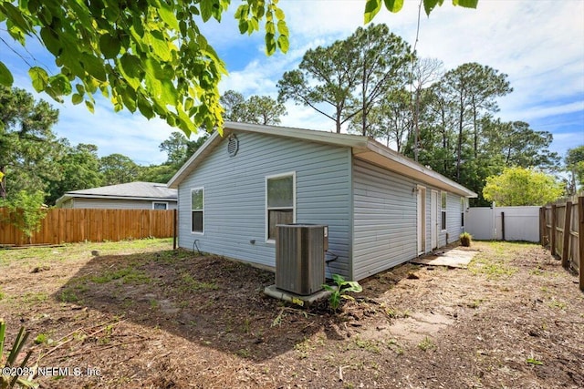 1528 Jordan St, Atlantic Beach, FL 32233 - view of home's exterior with cooling unit and a fenced backyard