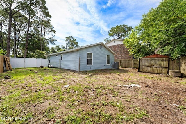 1528 Jordan St, Atlantic Beach, FL 32233 - rear view of house featuring cooling unit and a fenced backyard