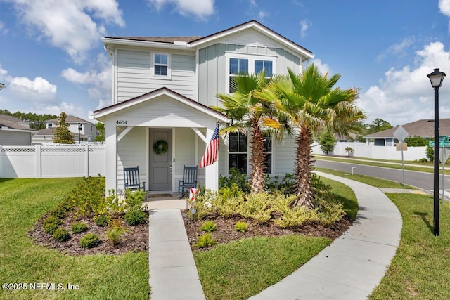 4604 Clapboard Crossing Way, Jacksonville, FL 32226 - view of front of property featuring board and batten siding and a porch