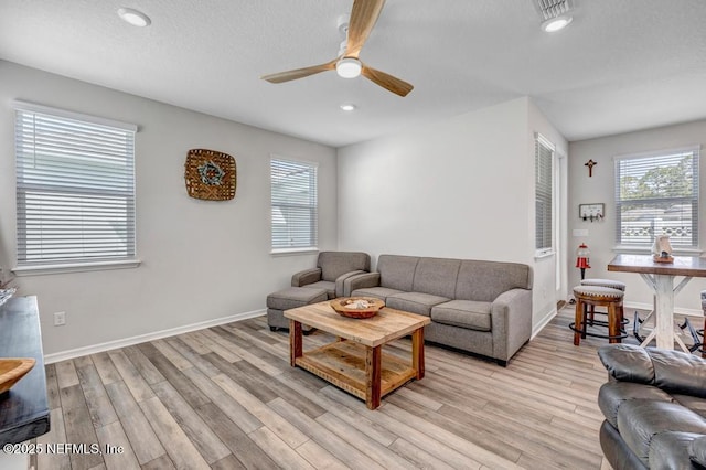 4604 Clapboard Crossing Way, Jacksonville, FL 32226 - living room featuring ceiling fan, light wood-style floors, recessed lighting, and baseboards