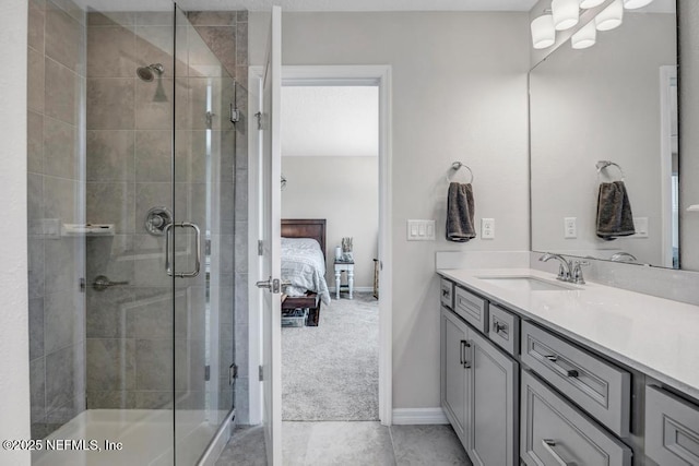 4604 Clapboard Crossing Way, Jacksonville, FL 32226 - full bath featuring vanity, connected bathroom, a stall shower, baseboards, and tile patterned floors