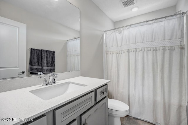4604 Clapboard Crossing Way, Jacksonville, FL 32226 - bathroom featuring vanity, toilet, and tile patterned flooring
