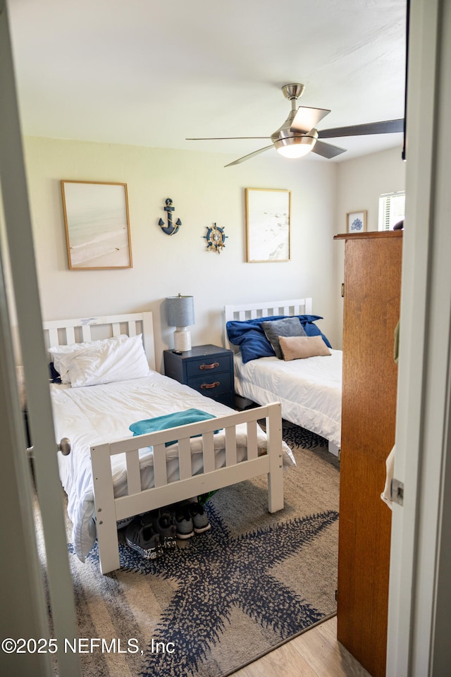 14 Ballard Ln, Palm Coast, FL 32137 - bedroom featuring wood finished floors and ceiling fan