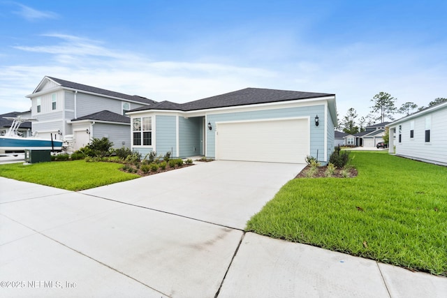 2446 Glade Ln, Green Cove Springs, FL 32043 - view of front of home featuring a garage, a front lawn, and driveway