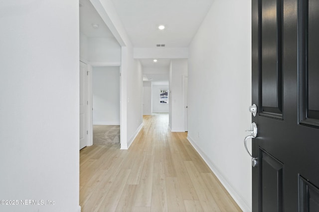 2446 Glade Ln, Green Cove Springs, FL 32043 - hallway featuring light wood-type flooring, baseboards, and recessed lighting
