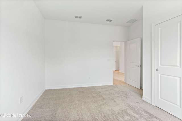 2446 Glade Ln, Green Cove Springs, FL 32043 - unfurnished bedroom featuring light carpet and baseboards