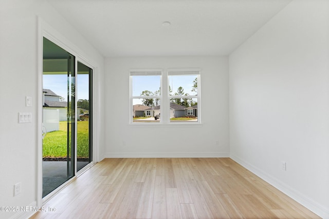 2446 Glade Ln, Green Cove Springs, FL 32043 - unfurnished room featuring wood finished floors and baseboards