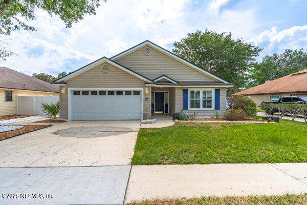 4420 Timber Hollow Way, Jacksonville, FL 32224 - view of front of house with an attached garage and driveway