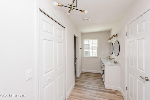 2522 Dauphine Ct W, Ponte Vedra Beach, FL 32082 - hall with baseboards and light wood finished floors
